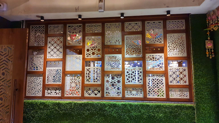 A vibrant hanging wall divider showcasing intricate designs.