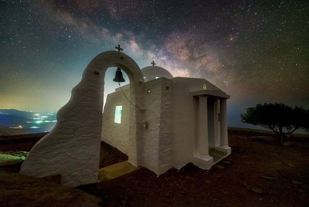 a white building with a star in the sky