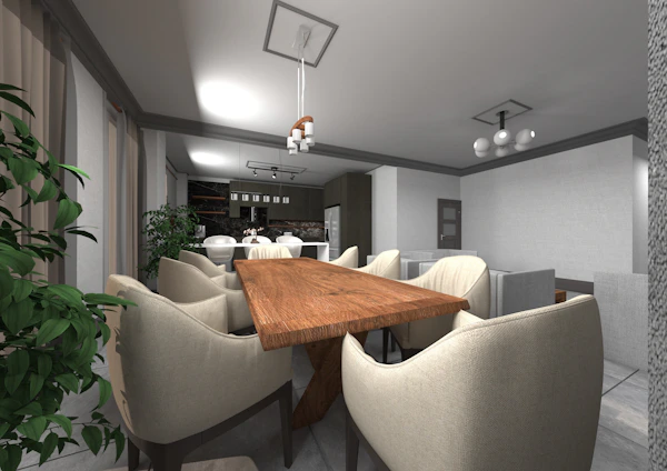 a room with a table chairs and a plant