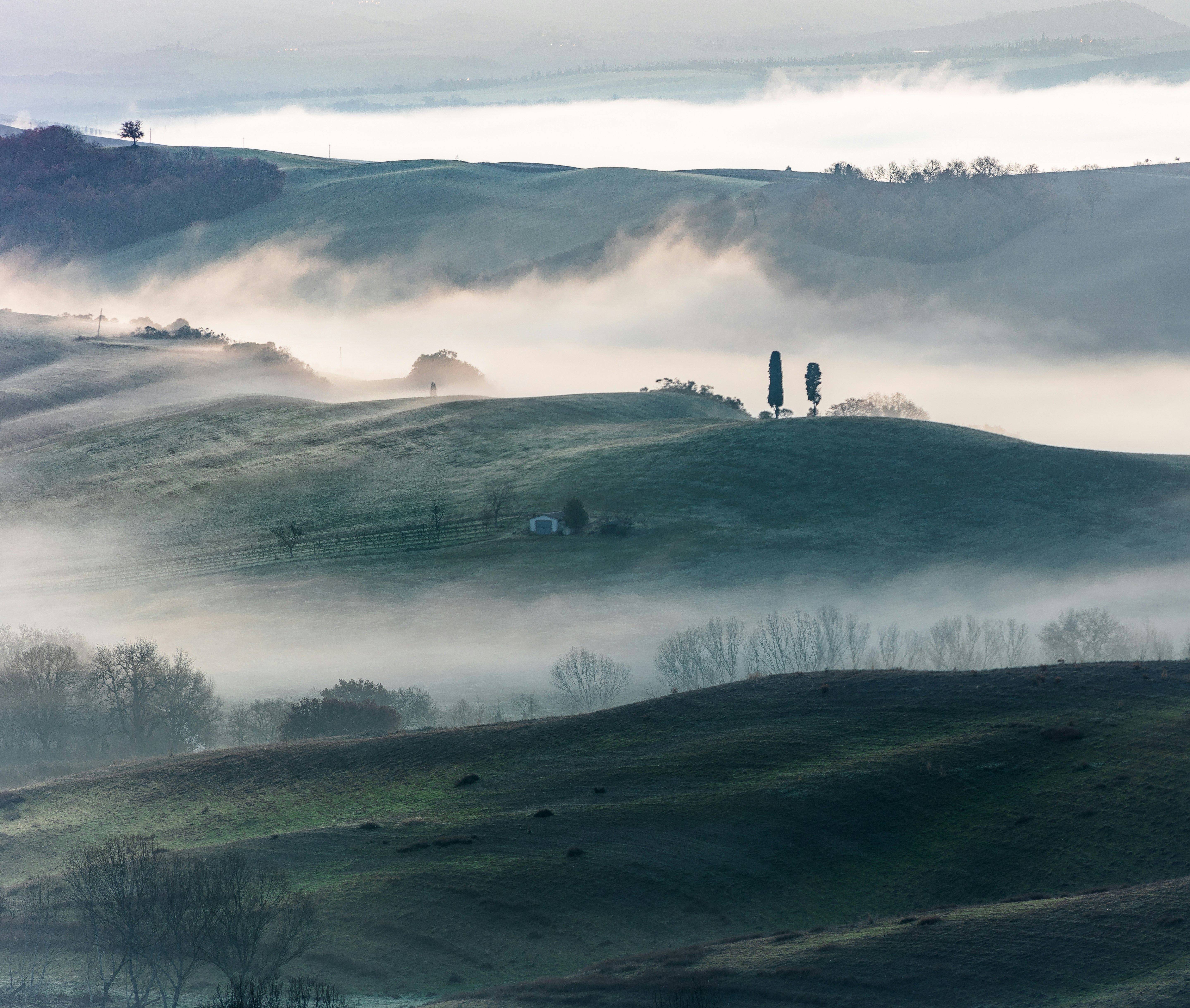 A landscape with hills and trees