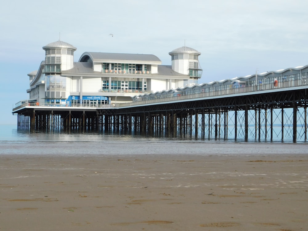 a pier with a building on the other side of it