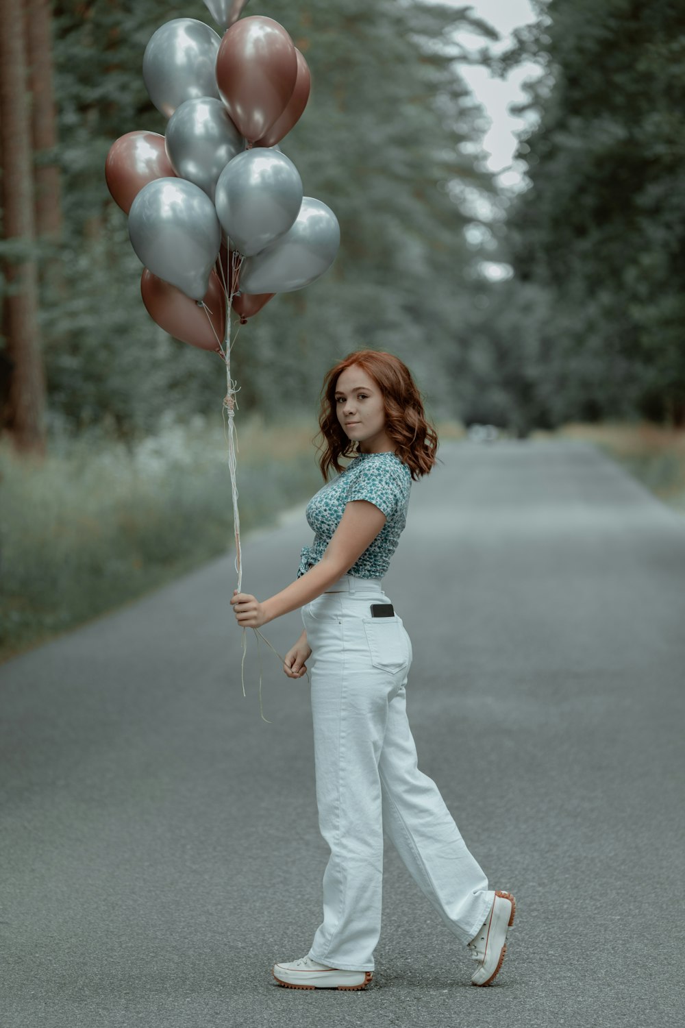 a person holding a balloon