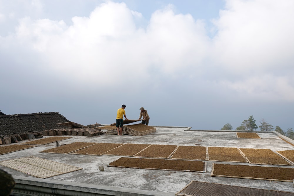 a man standing on a roof