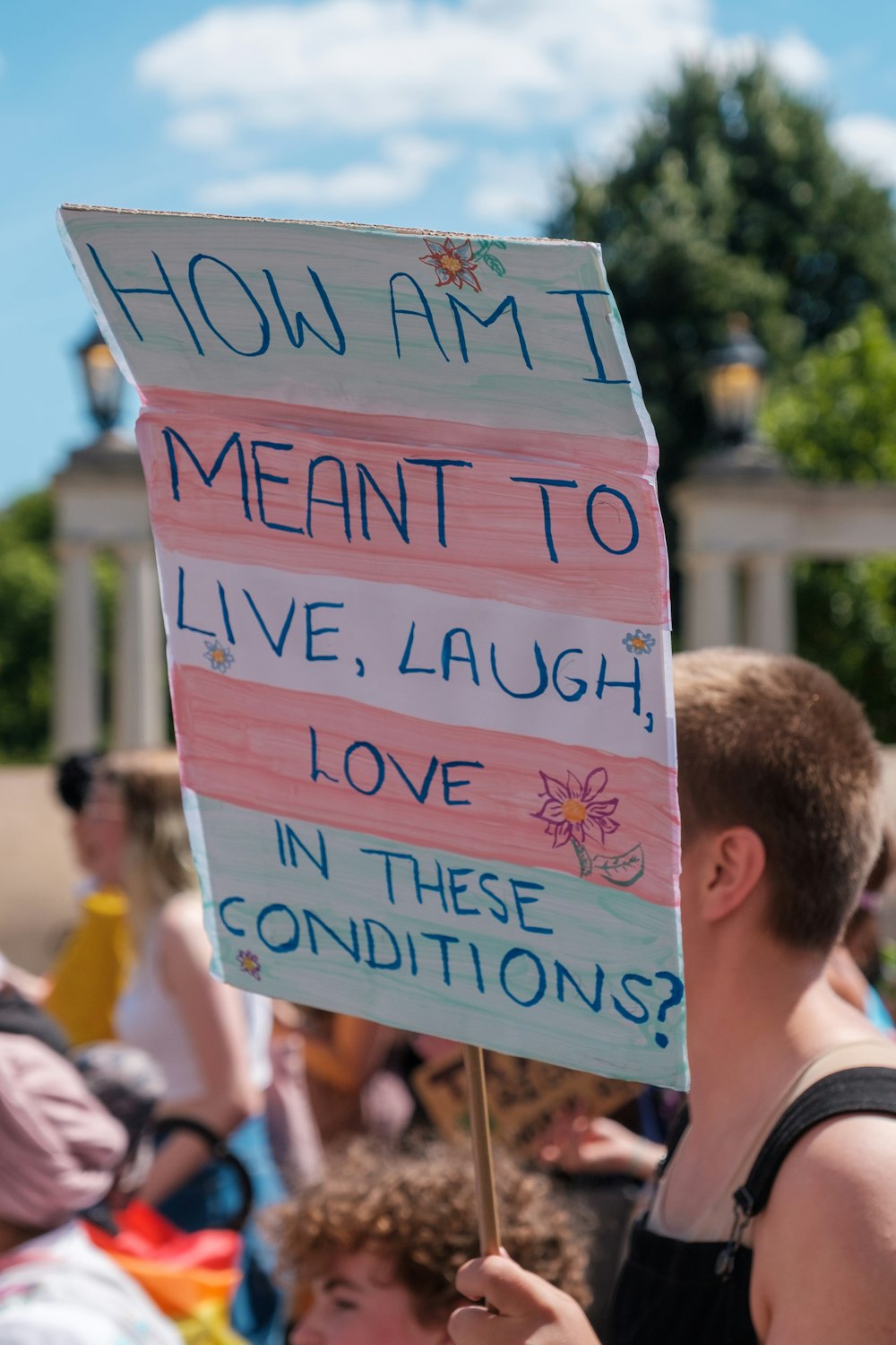 a person holding a sign