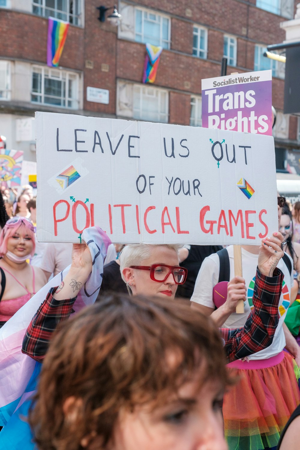 a group of people holding signs