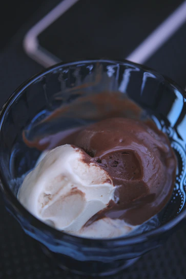 A sleek dark mode interface of the myicecreamstudio app showing technical ice cream formulation tools.