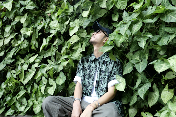 a person sitting in a bush
