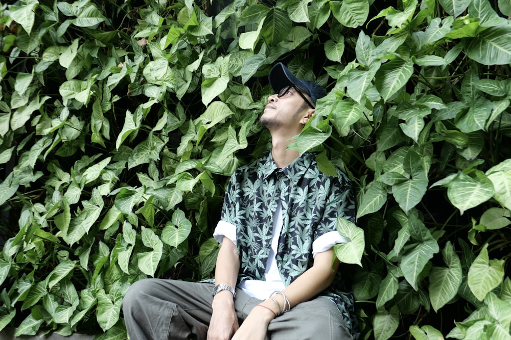 a person sitting in a bush