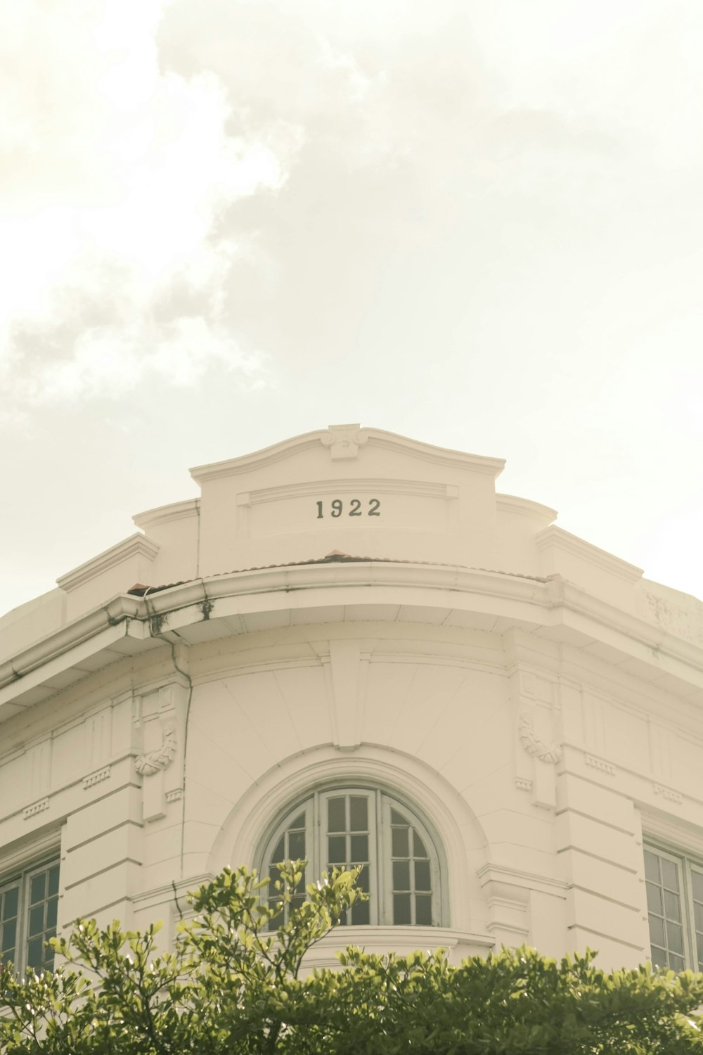 a white building with a sign on it