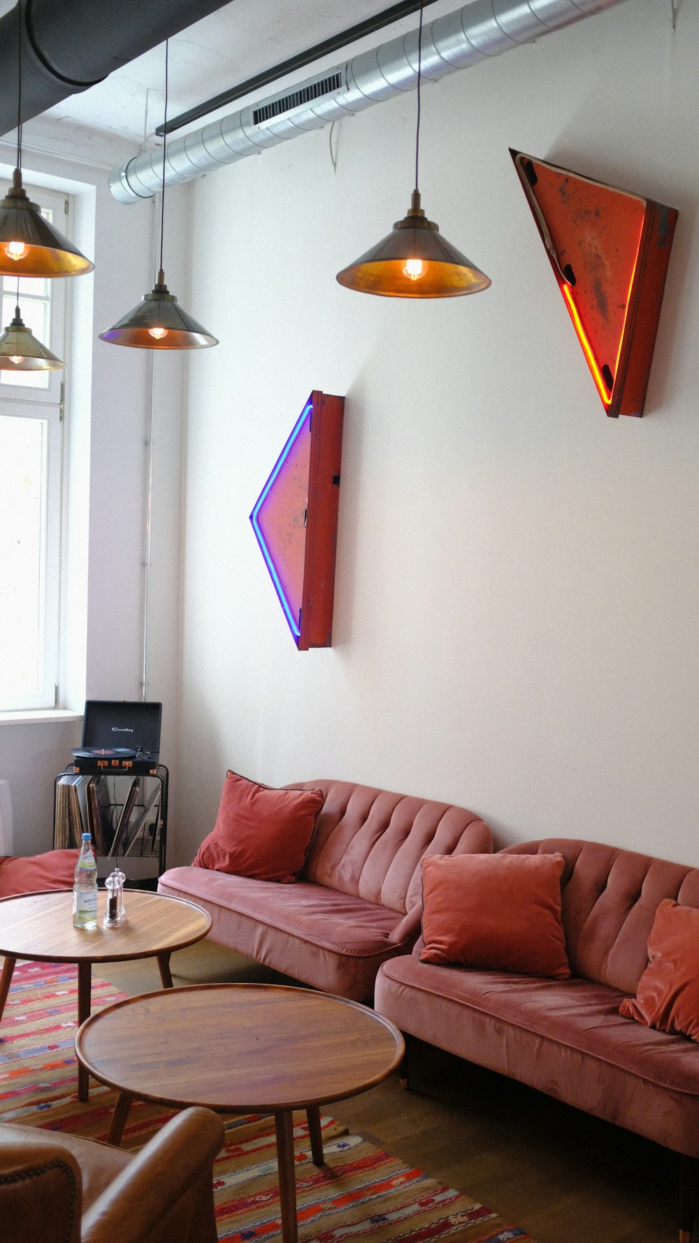 a living room with a couch and a table