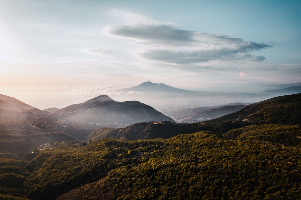 a landscape with hills and mountains