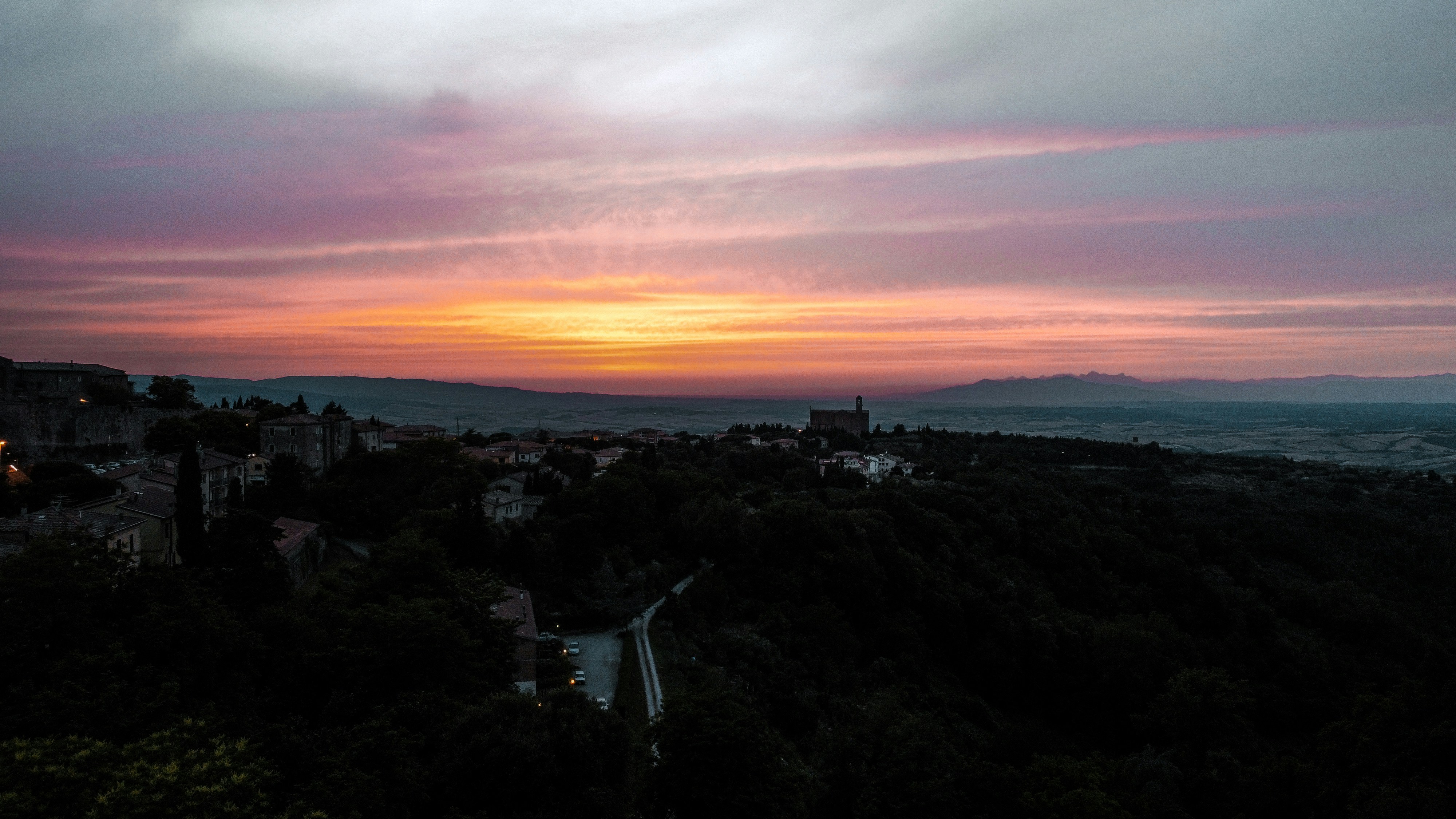 a city with a sunset