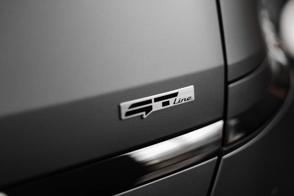 a close up of a car's logo