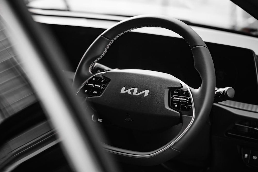 a steering wheel and dashboard of a car