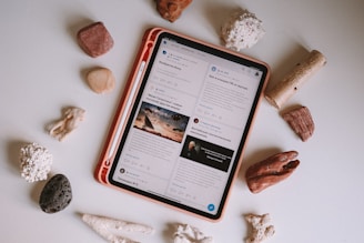 a tablet and some rocks