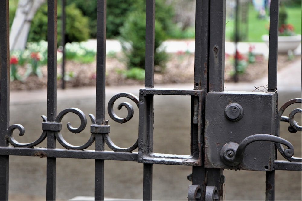 a metal fence with a metal gate