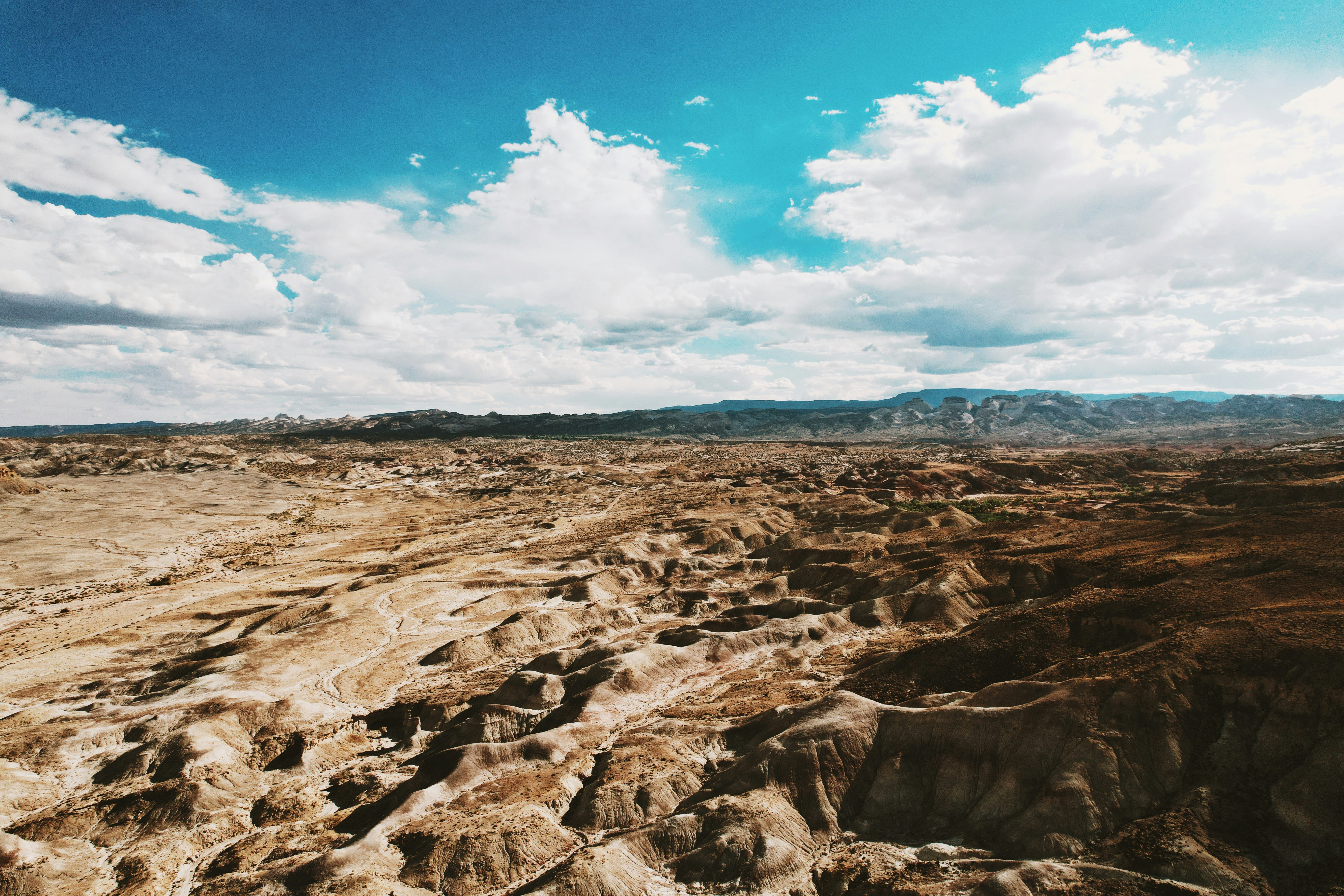 a rocky landscape with a blue sky