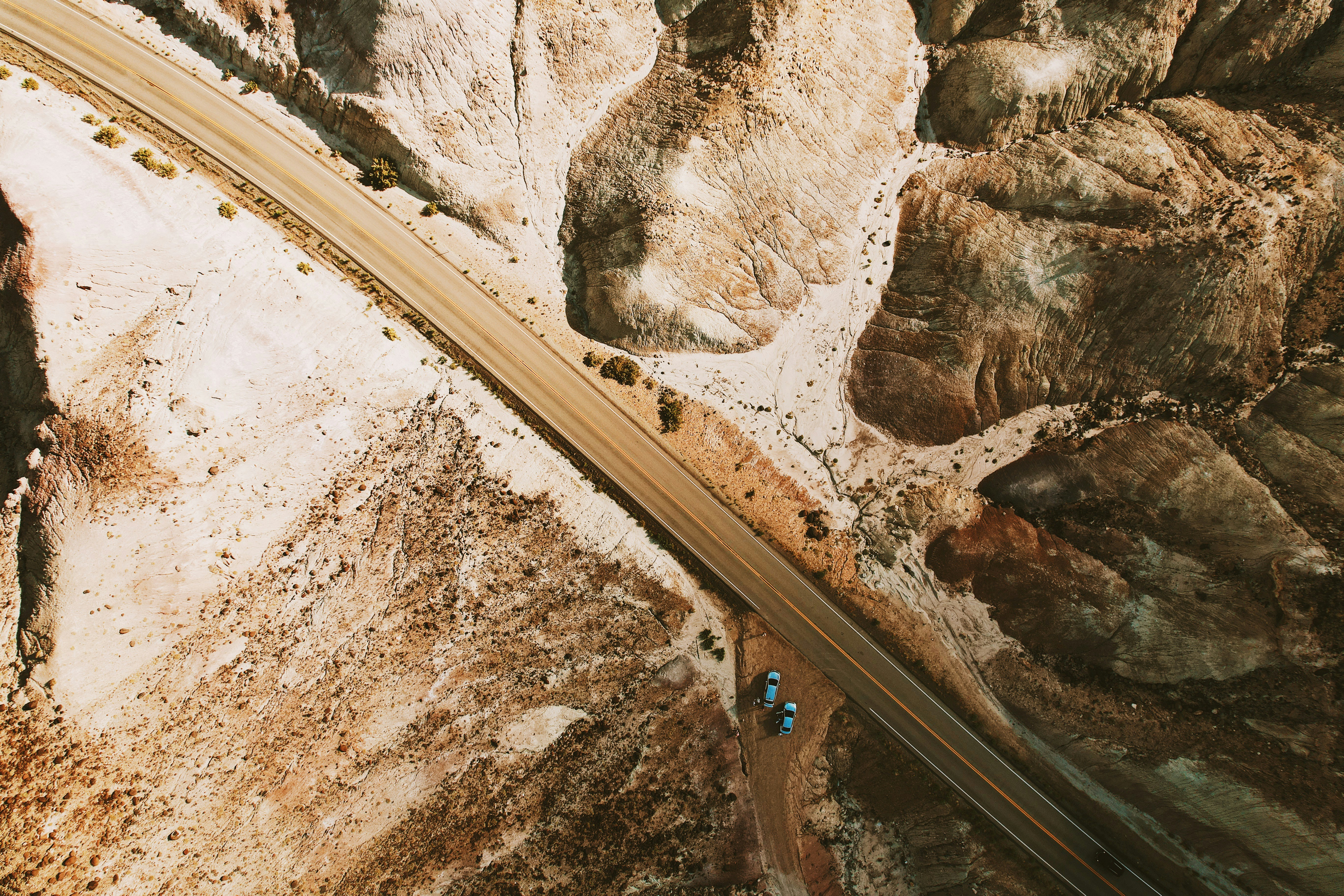 a person walking on a bridge over a river