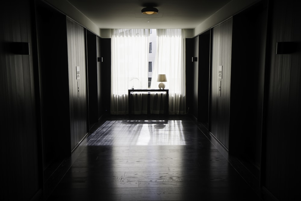 a hallway with a wood floor