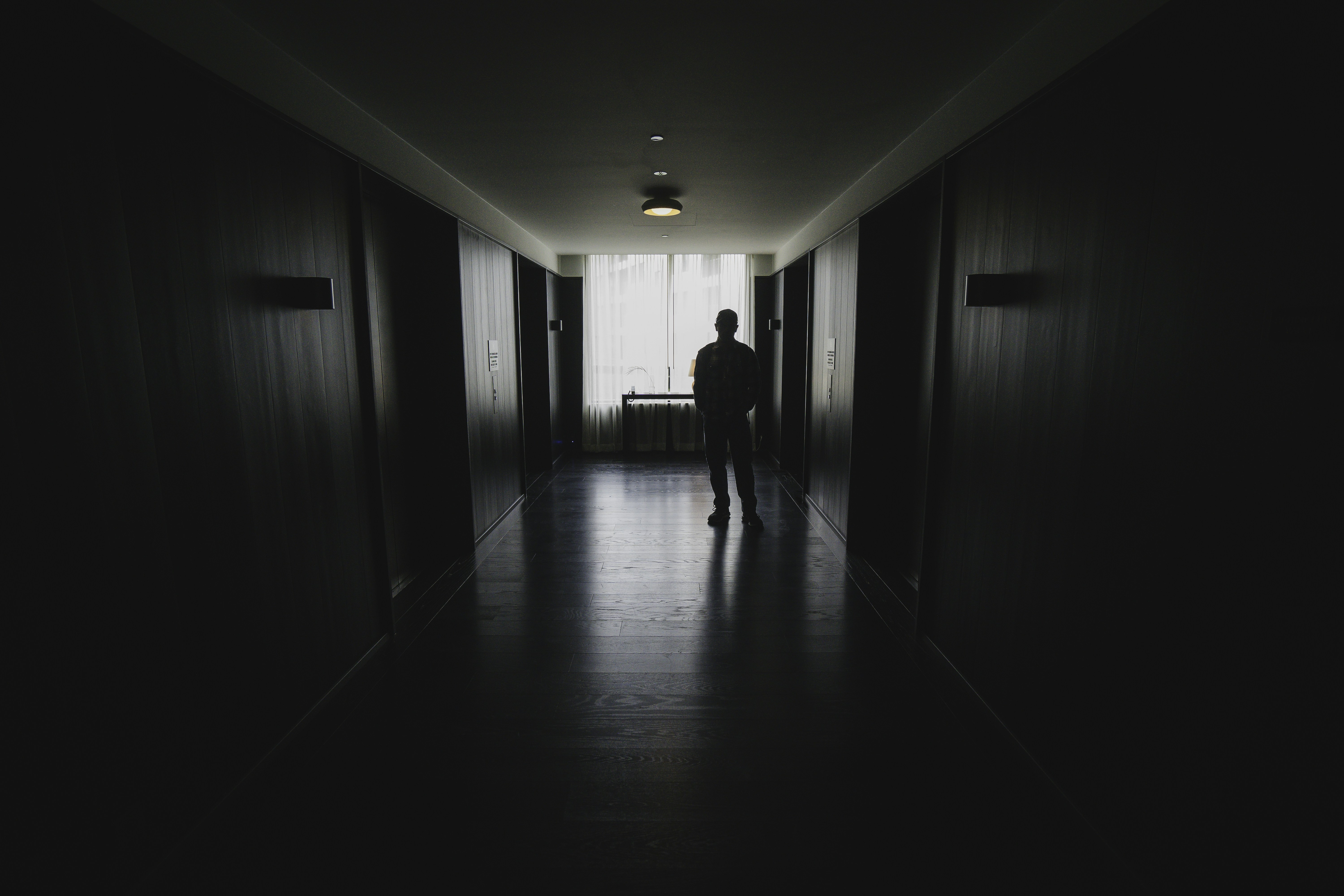 a person walking in a hallway