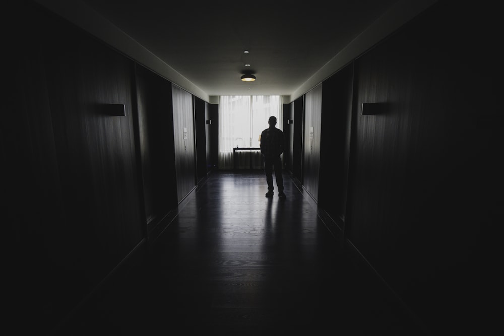 a person walking in a hallway