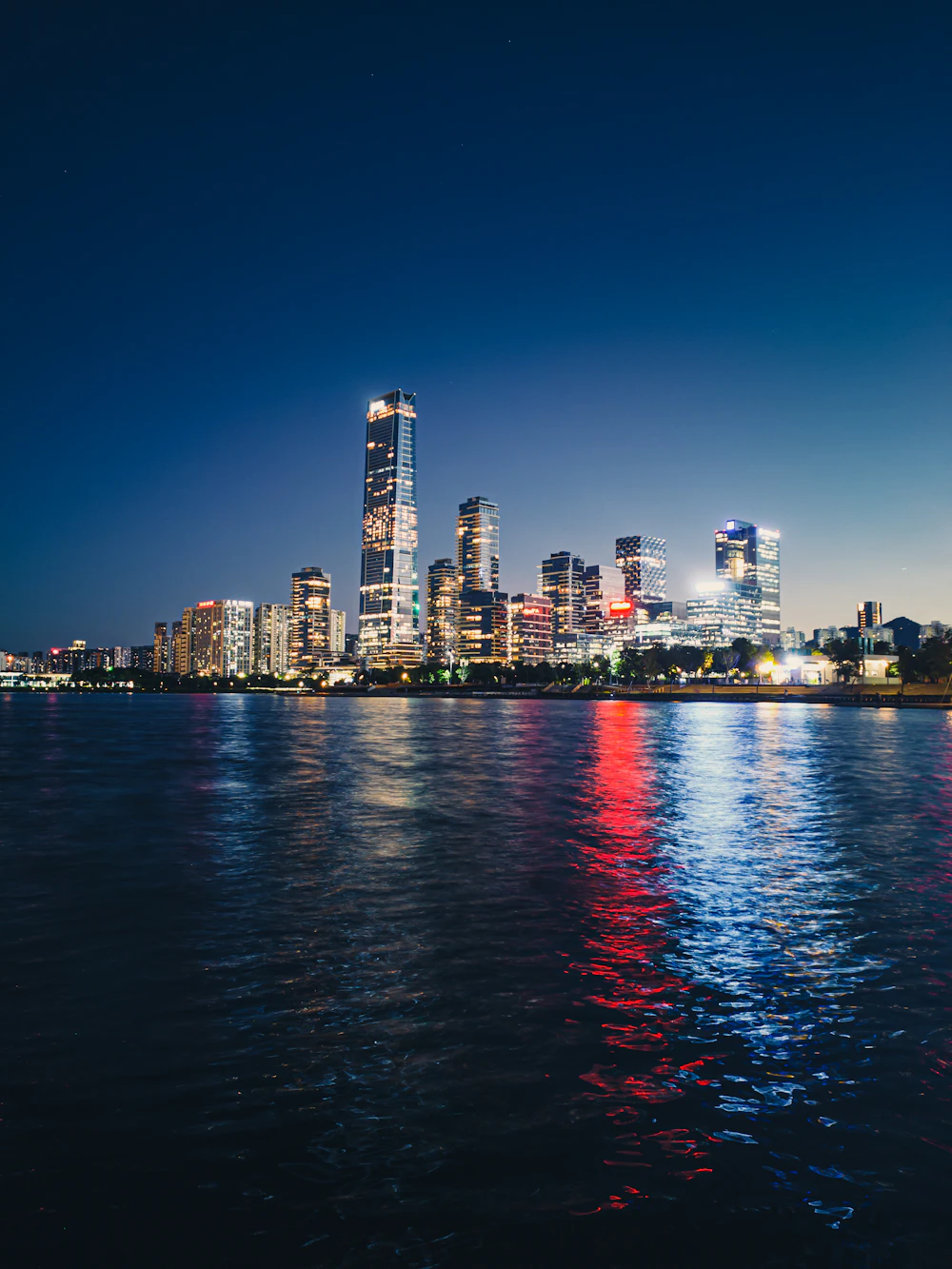 Shenzhen Bay's modern financial skyline at dusk