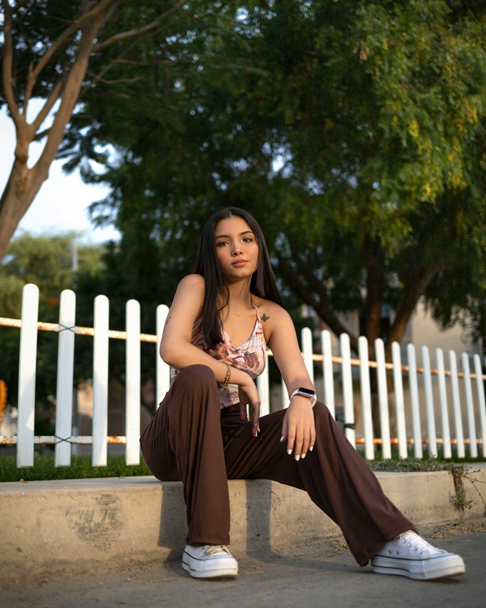 a person sitting on a park bench