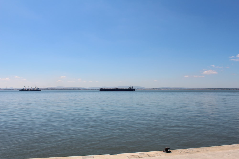 a body of water with a land in the distance