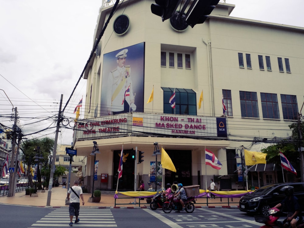 a building with flags on the roof