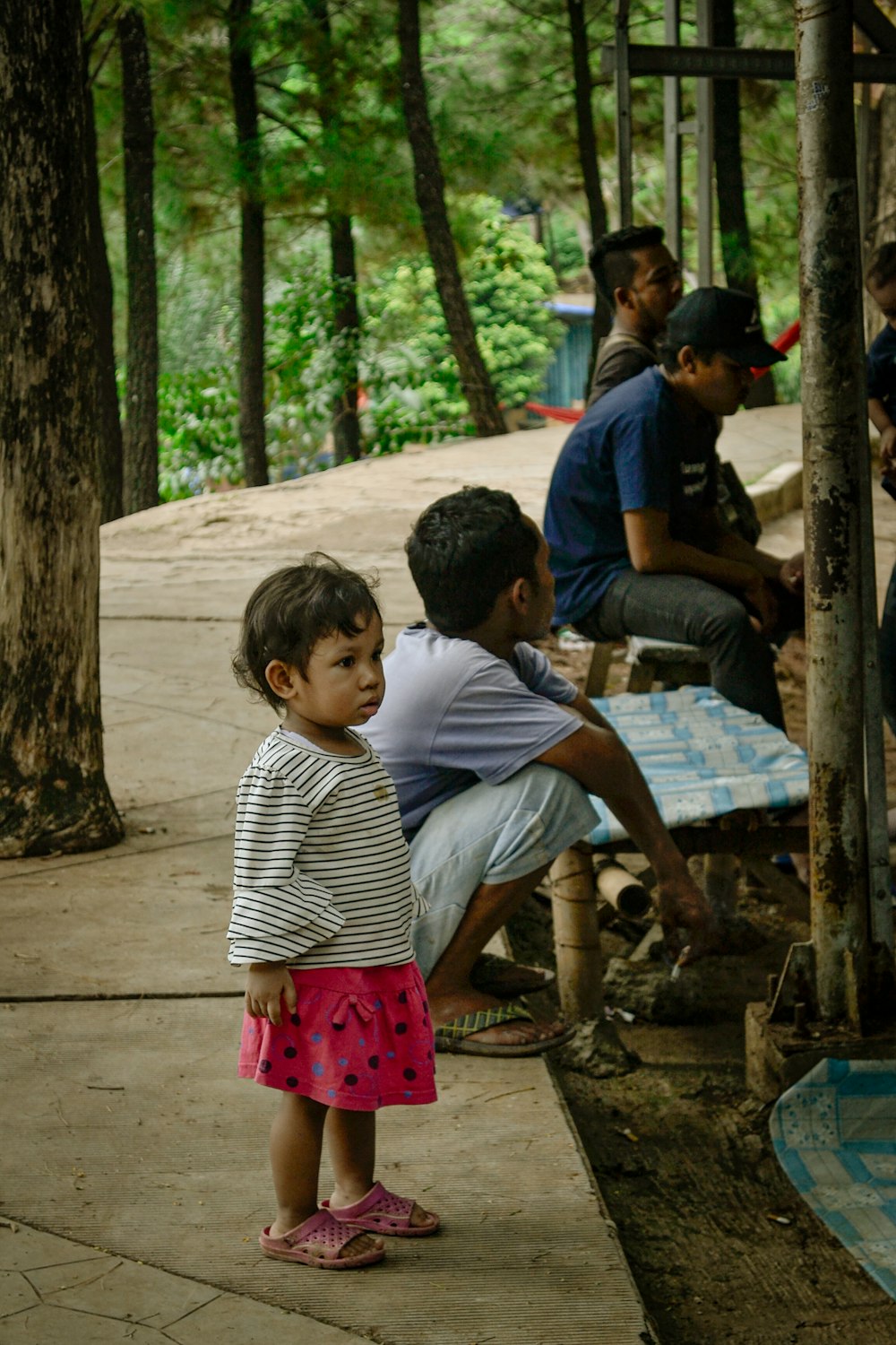 a group of people sitting on a bench