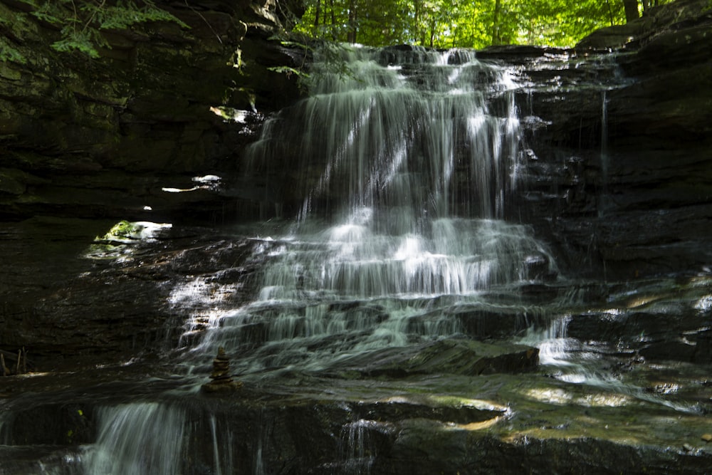 a waterfall in a rocky place