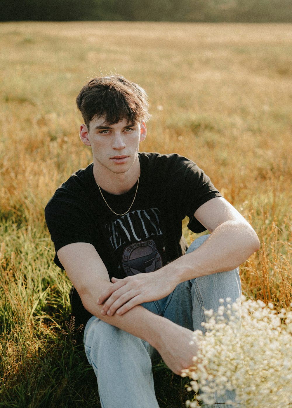 a person sitting in a field