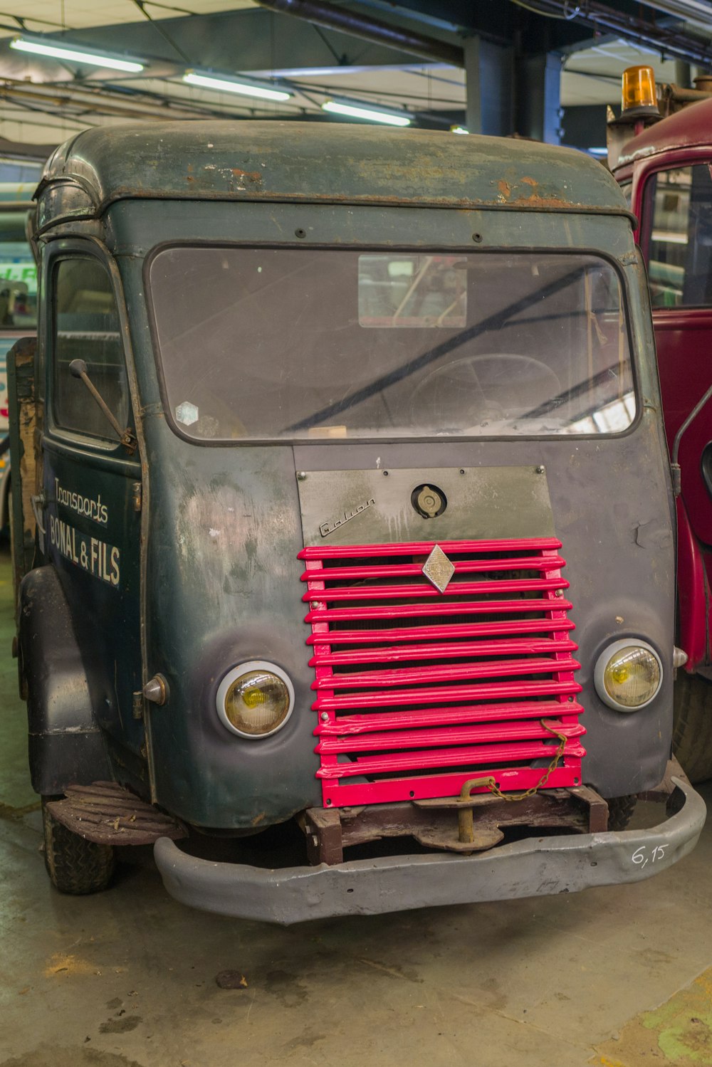 a car with a red grill