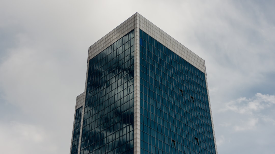 a tall glass building,
