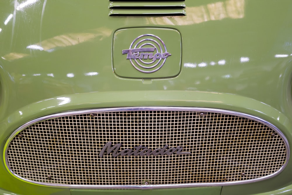 a close up of a car's logo