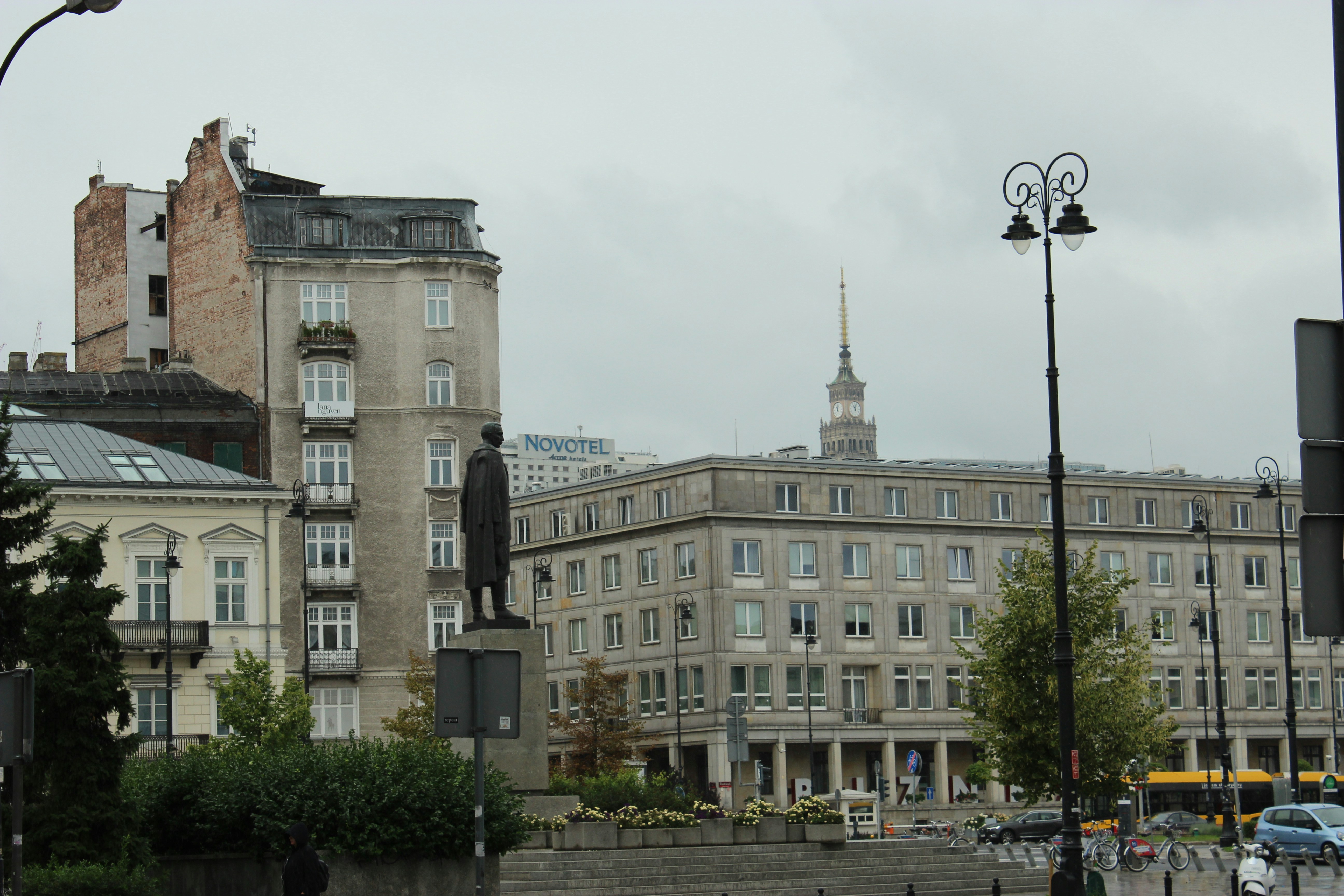 a statue in front of a building