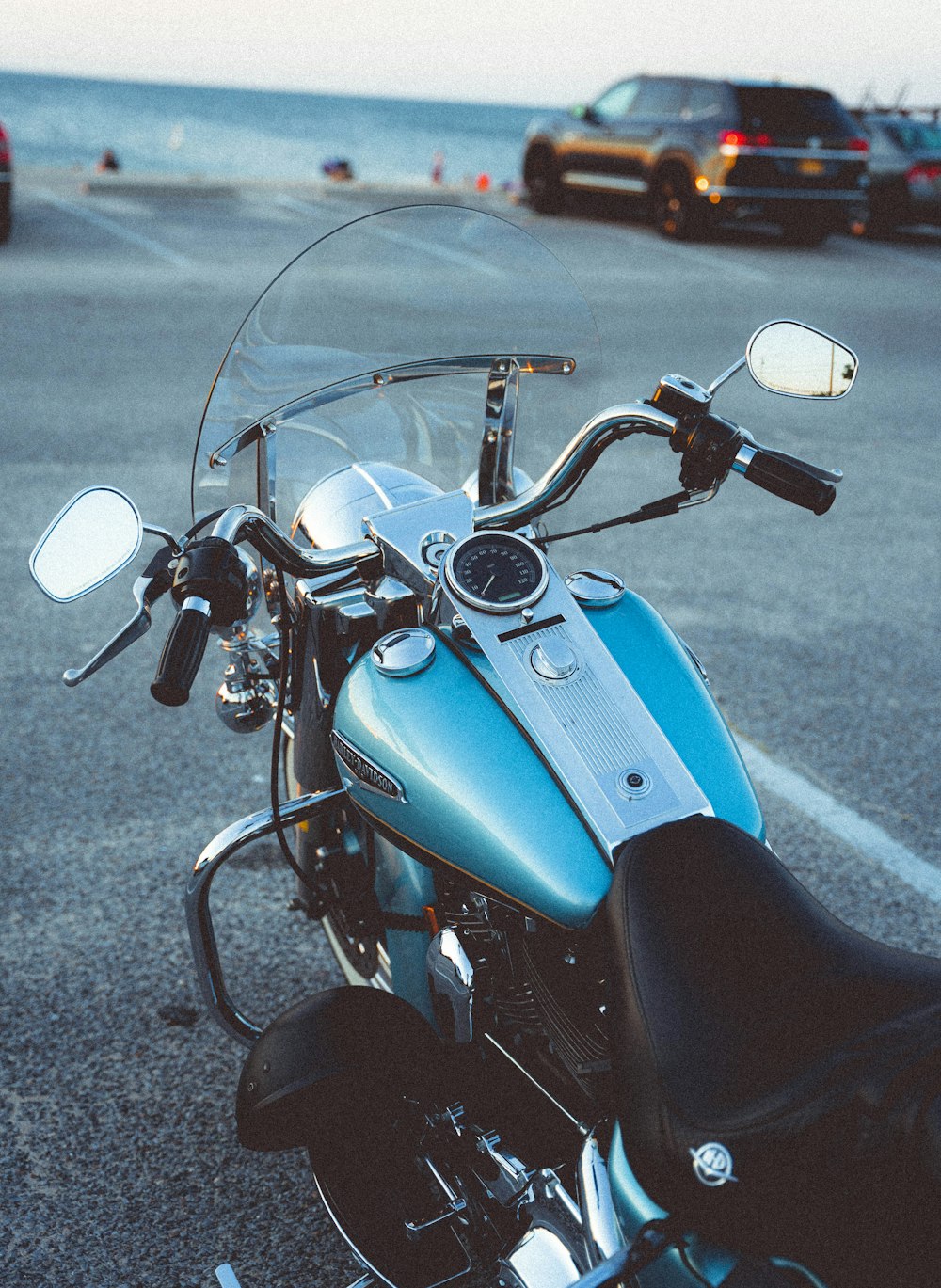 a motorcycle is parked on the side of a road