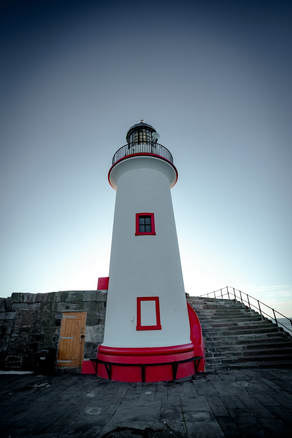 a white and red lighthouse