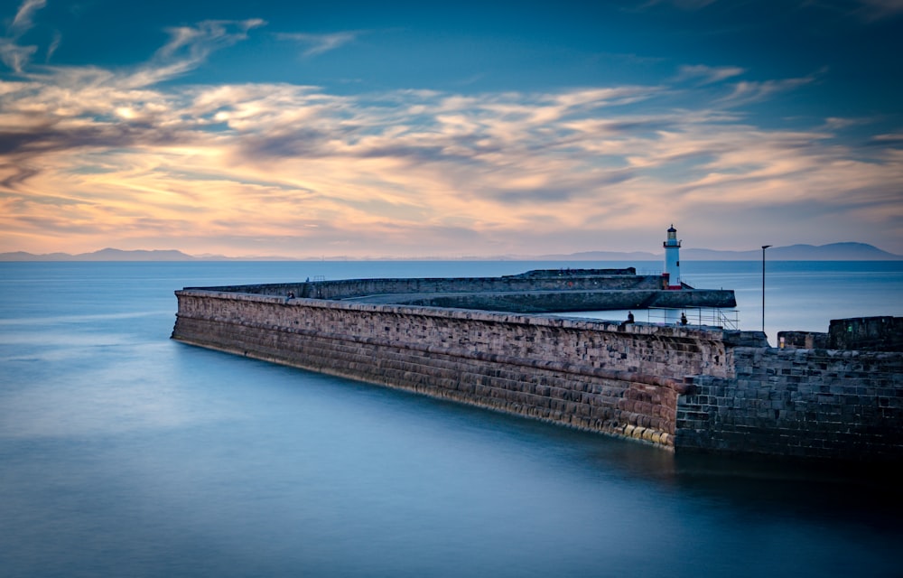 a lighthouse on a cliff