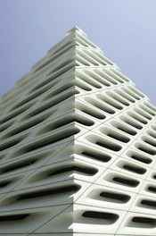 a tall white building