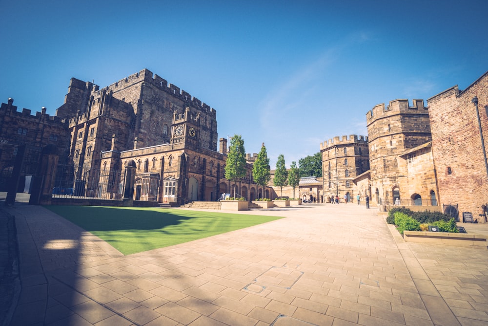 a large stone building with a courtyard