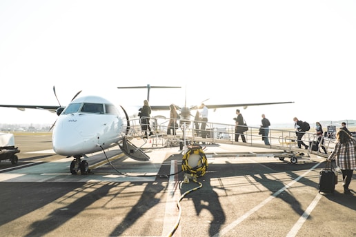 people boarding a plane