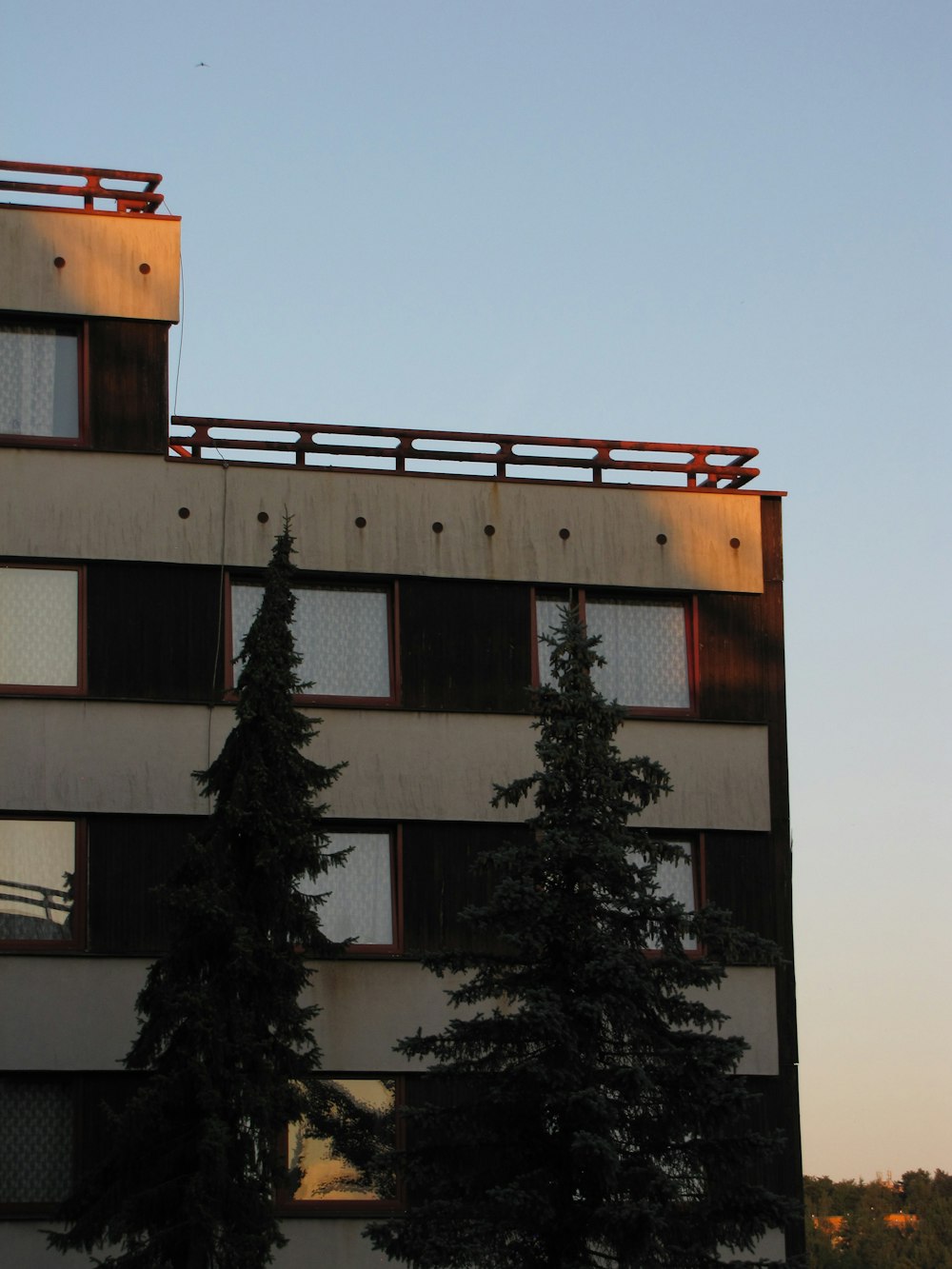 a building with a tree in front of it