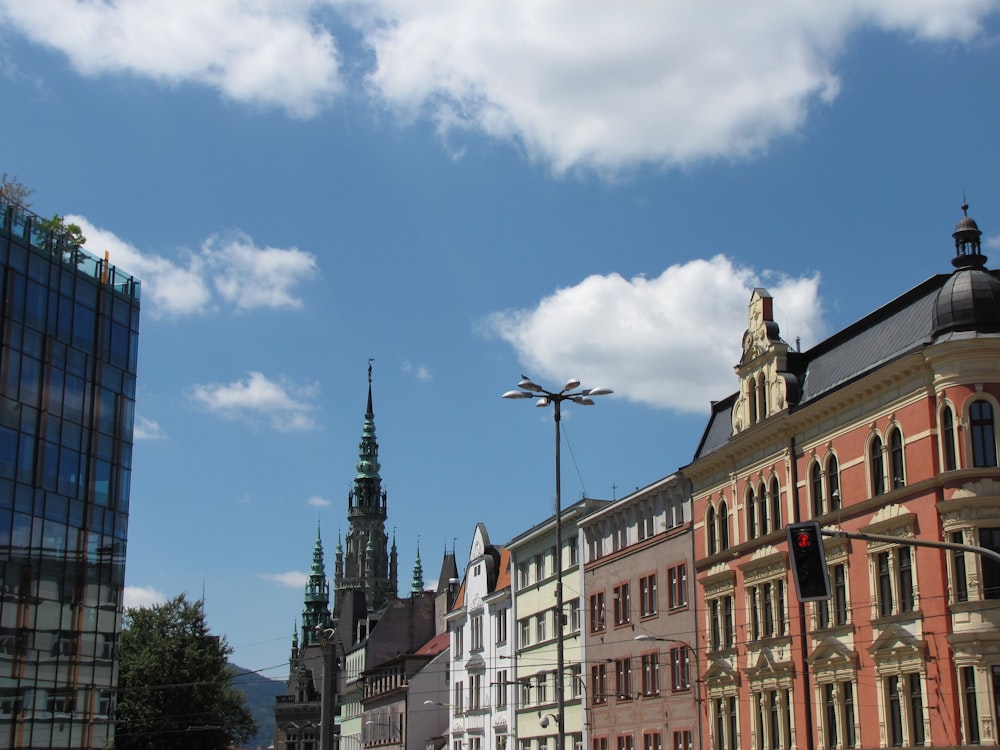 a city with buildings and a street light