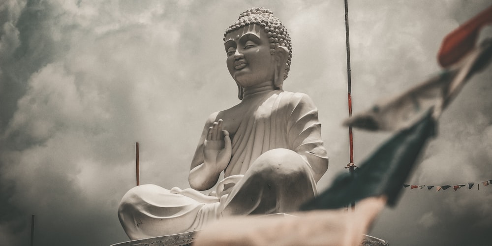 a statue of a man holding a sword