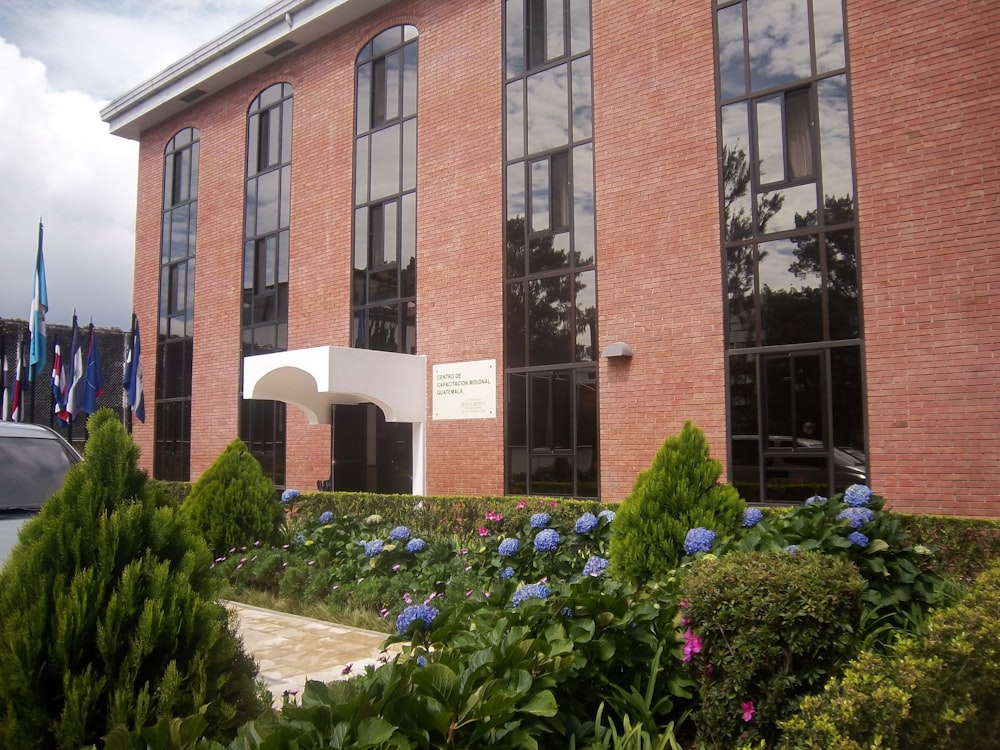 a brick building with a sign on the front