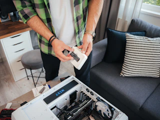 a person holding a remote control