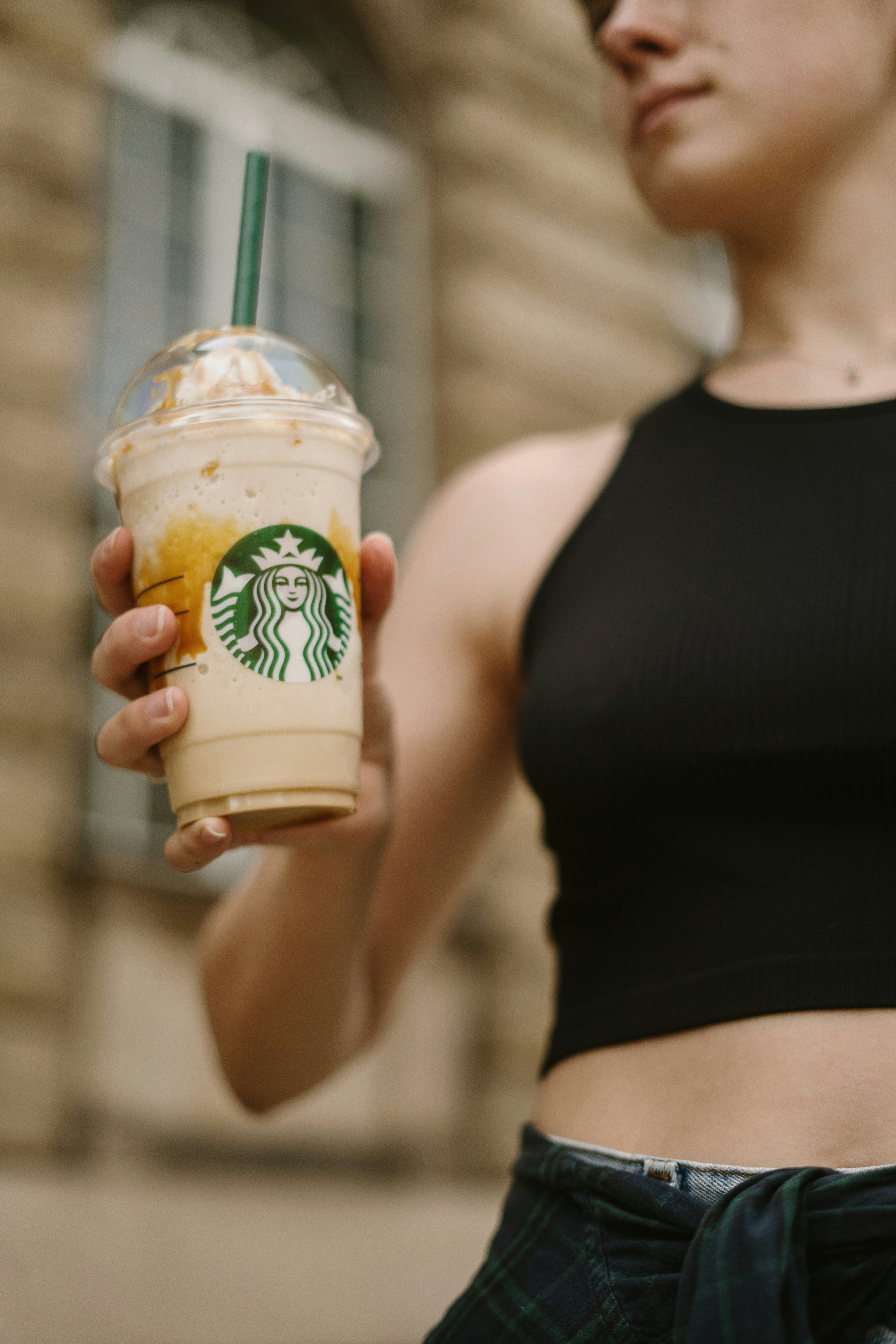 a person holding a cup