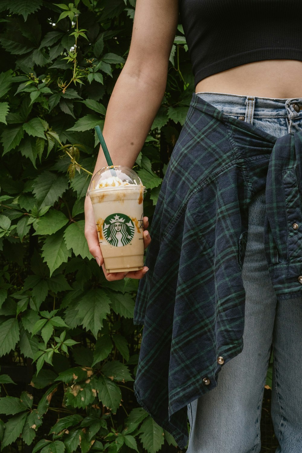 a person holding a can