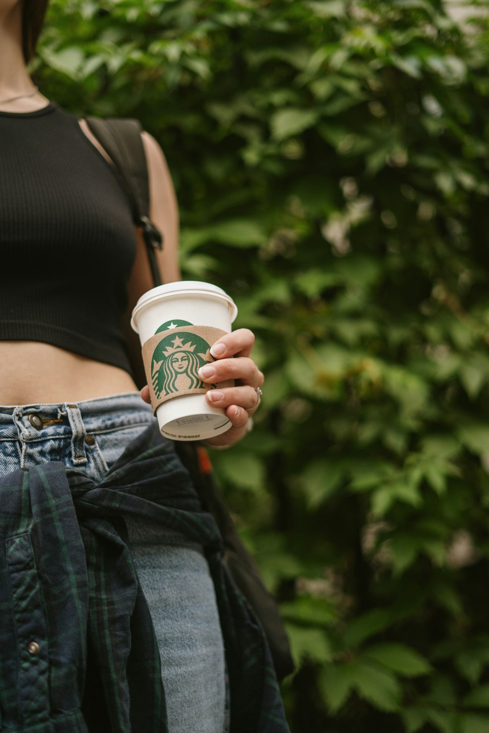 a person holding a cup